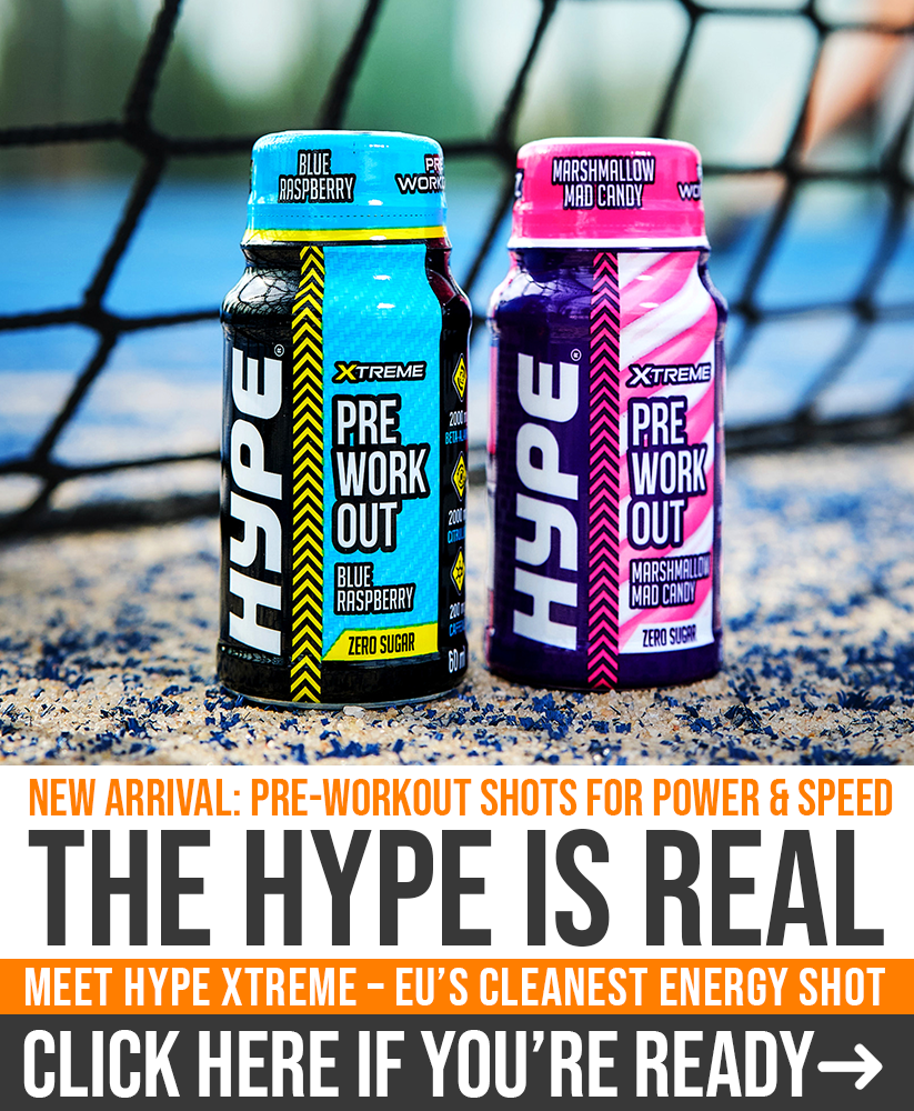 Two colorful bottles of HYPE XTREME Pre-Workout Shots, Blue Raspberry and Marshmallow Mad Candy flavors, placed on a blue tennis court with bold labels highlighting “Zero Sugar” and “Pre Workout” — promoting new EU supplement arrivals in the UAE.